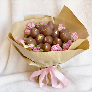 Strawberries and flower bouquet